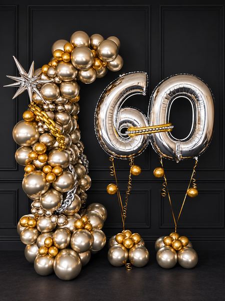 Sessantesimo compleanno con arco dorato